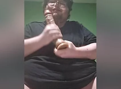 Fat Male In Chastity Sucking A Dildo And Drooling Like A Waterfall