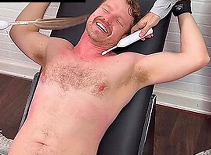 Russ Laughs Hard While His Doms Dan And Girth Tickle His Big Feet