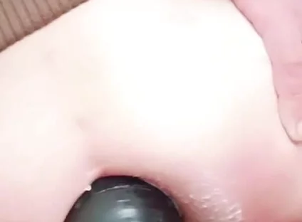 Young Woman in Her Blue Panties Enjoying a Pleasurable Experience with a Mega Dilator