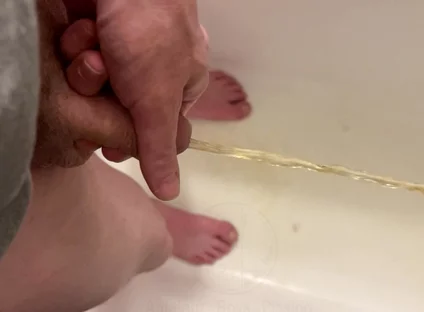 Amateur Boy Pissing, with Close-up and Good Quality Slow Motion of the Load of Pee Coming Out of the Pee-hole (urethra)