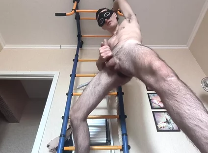 Cock Shaking While Hanging on the Horizontal Bar