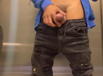 Enjoying Masturbation in a Public Bathroom