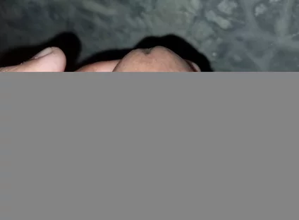 The Gay Boy Went to the Toilet, Turned on the Flash Light on His Mobile Phone, and Started Licking His Private Parts with Spit.