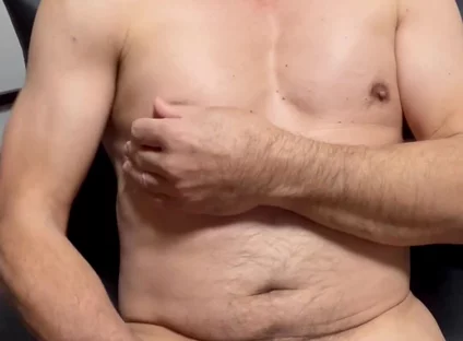 Masturbating