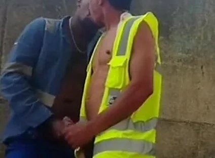 Two Workers Behind the Service Wall