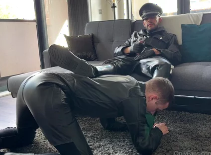Leather master boots licking