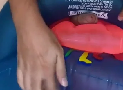 Playing with inflatable swim ring