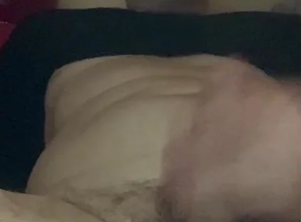 Masturbating