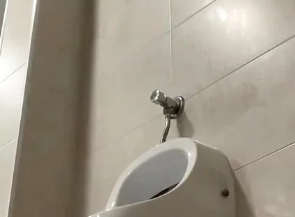 Amateur Twink Boy and Older Guy Caught Having Risky Fun in the Pool's Public Toilets