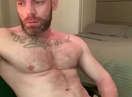 Masturbating