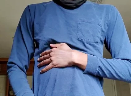 Masturbating