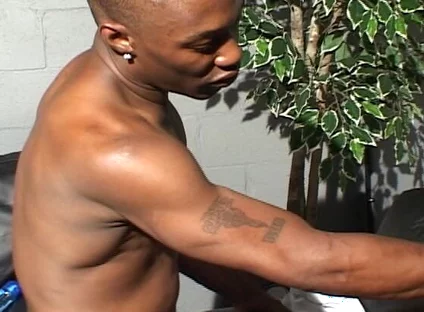 Tattooed Black Man Spanks and Bangs a Dude with Tight Asshole in Bareback Style