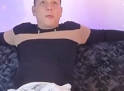 Latino Shows off His Bump on Camera Inside His Gray Sweatshirt