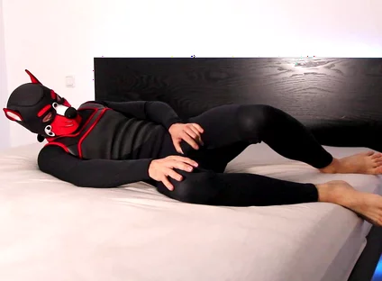 Horny Neoprene Puppy Humping and Teasing Himself