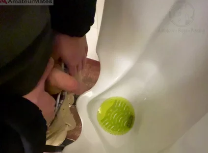 Amateur Redhead Guy Caught Pissing in a Public Toilet's Urinal - He Then Quickly Plays with His Cock Before Leaving