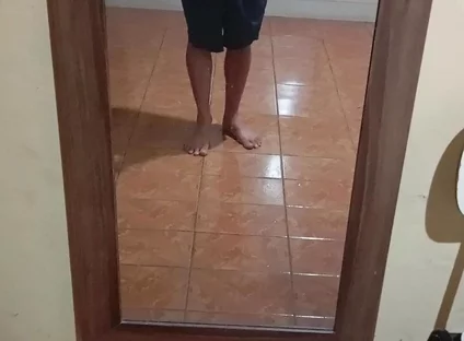 Boy in Shorts in the Mirror