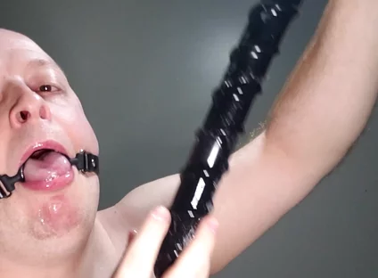 Deepthroating an 18 Inch Dildo with Mouth Gag Ring