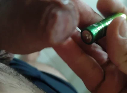 Inserting Electric Batteries Inside the Wet Dick
