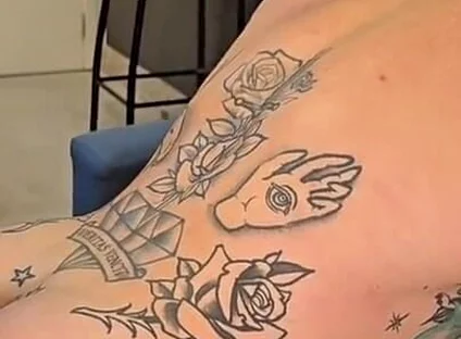 Big Tattooed Guy with a Tight Ass