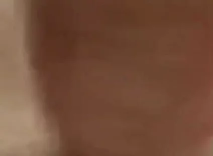 Masturbating