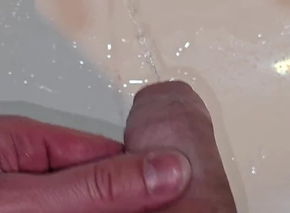 Pissing to the Bathroom Sink