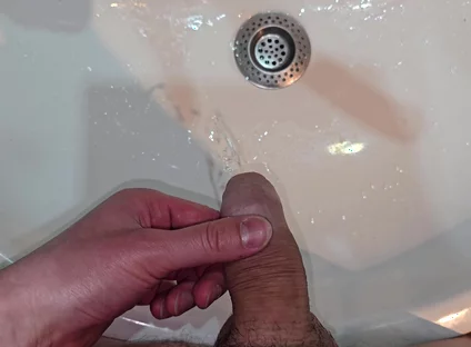 Pissing to the Bathroom Sink