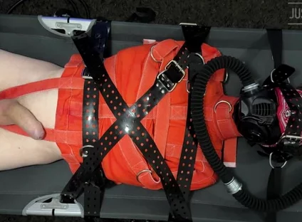 Bondage Twink Strapped to Campbed in Straitjacket and Gas Mask