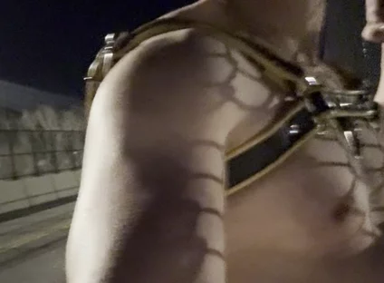 Midnight Muscle Tease: Asian Hunk Flexes Ass & Biceps in Yellow Harness on Highway Bridge