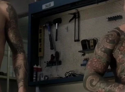 Two Friends in the Mechanic's Workshop