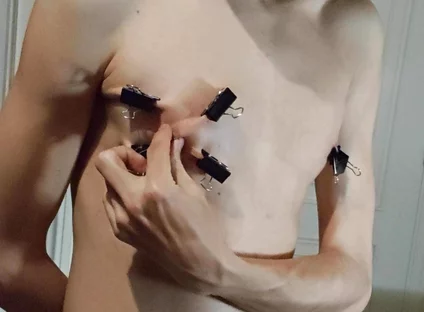 Twink Playing with Binder Clips