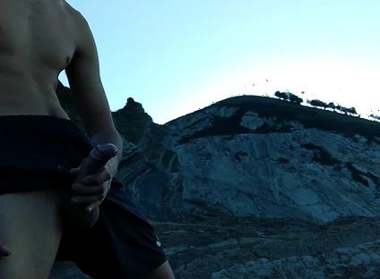 Horny Slim Brown Guy Jerks off Hard in a Heavenly Place Under the Sunset