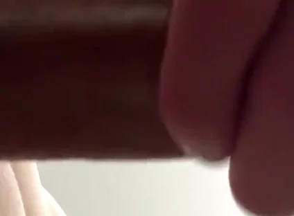 Masturbating