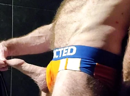 Muscle Bear Showing off His Uncut Cock