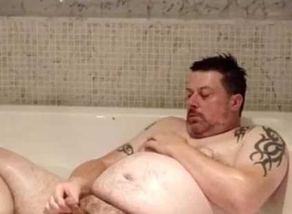 In the Big Bath Having a Wank