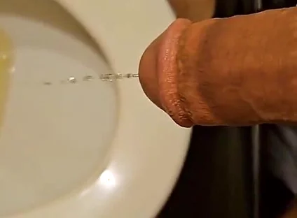 Shaved Cock Pissing