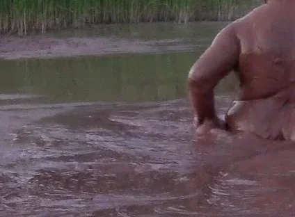 Mud Bath in Deep Quarry Mud Pond