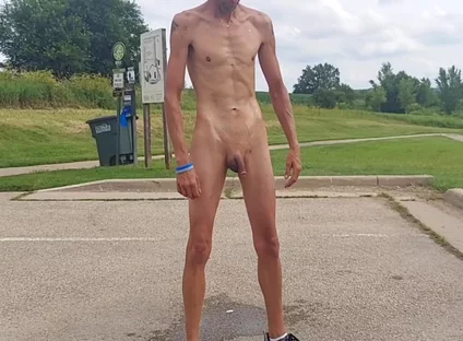Naked and Pissing in Parking Lot