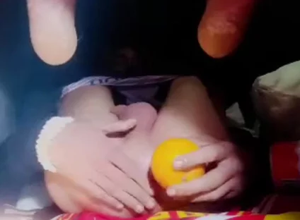 A Young Man Stuffs a Crystal Ball and an Orange up His Tight Ass.