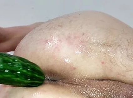 Close Up Cucumber Insertion With Massage Oil And Precum As Lube