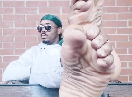 I Expose My Feet and I Touch Them