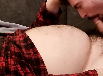 Sucking off a Hairy Bear on the Sofa