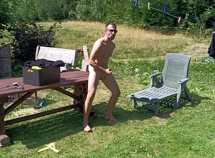Jerking off While Hanging Out the Laundry