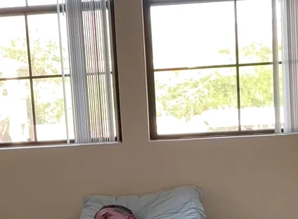 Watching Him Drift Between Shirts and Shorts