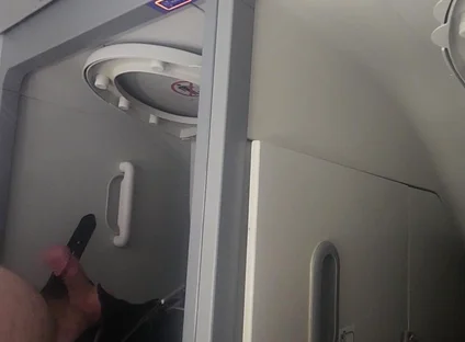Airplane Bathroom Jerk and Cum.
