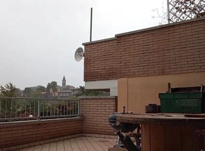 On the Terrace, in the Rain