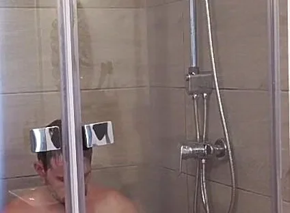 After a Full Day on the Road Wet Solo in the Hotel Shower