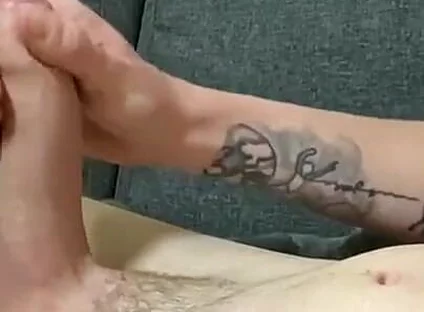 Naked Twink Lays on Sofa Stroking Huge Uncut Cock Until Cumming on Ripped Abs - Amateur Solo