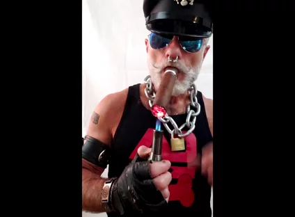 Leather Stepdad Lighting a Big Ring