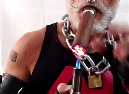 Leather Dad Lighting a Big Ring