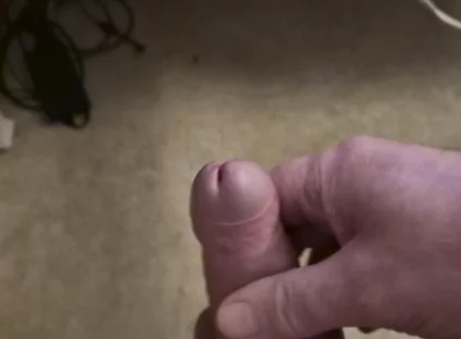 My Friend Sits in a Chair and Jerks off His Cock While Watching Video